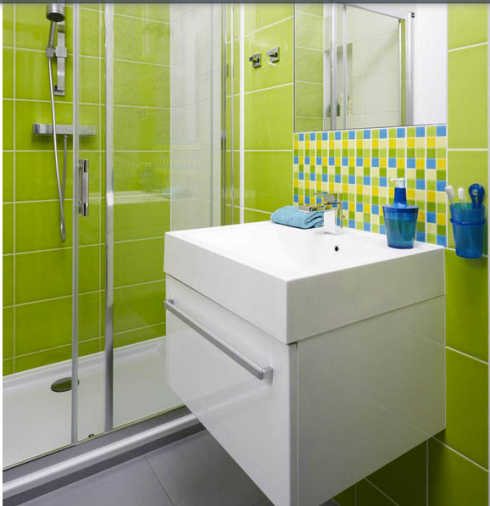 O tom de verde também foi utilizado no banheiro!